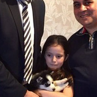 Алина получила в подарок щенка хаски, который попросила у Владимира Путина